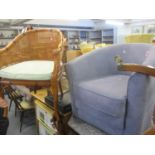 A modern cane seated and bamboo effect armchair together with a modern blue tub chair