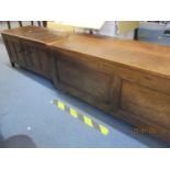 A reproduction oak coffer/low cabinet and a 1930's oak blanket box