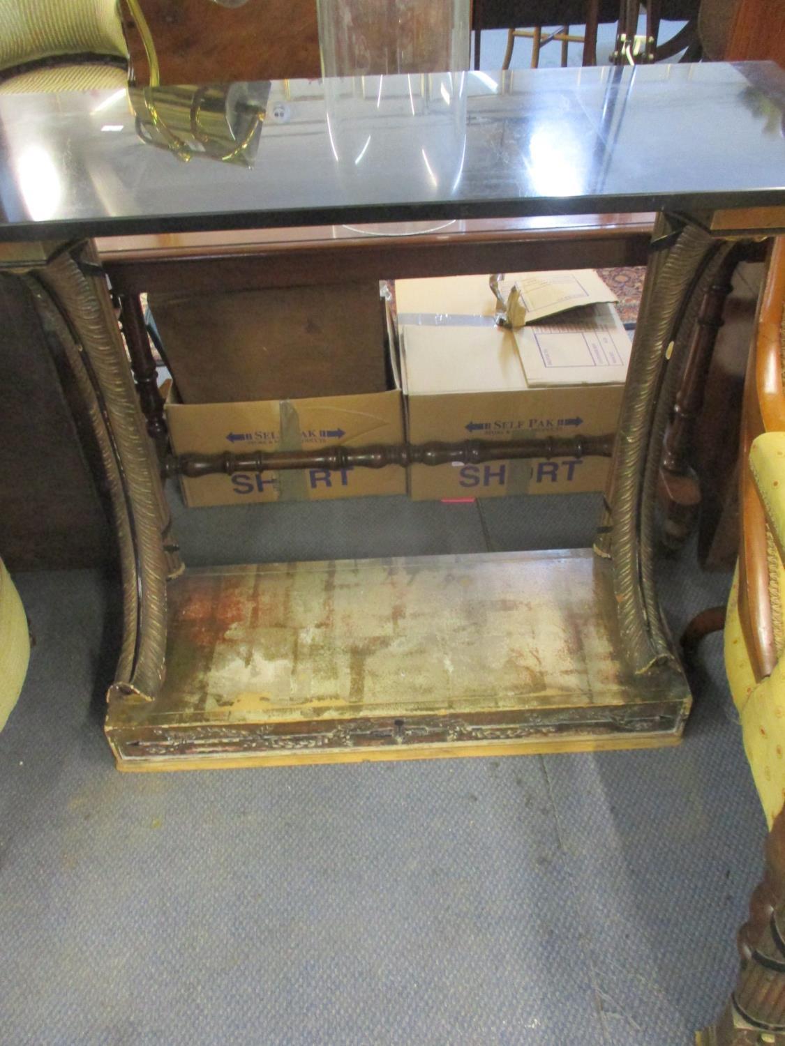 A gilt and black painted console table and matching Empire style mirror above a black marble - Image 2 of 3