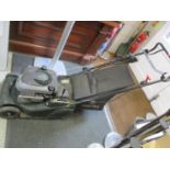 A Hayter Harrter 41 green petrol lawnmower