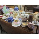 Mixed vintage household china to include tea cups with saucers, models of animals to include a