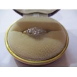 An 18ct gold and platinum diamond ring total weight 2.04g, UK ring size letter O