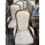 Four reproduction open armchairs with high backs having a cream leaf design upholstery