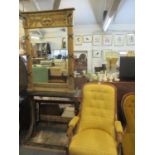 A gilt and black painted console table and matching Empire style mirror above a black marble