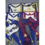 A selection of Masonic items to include four Masonic aprons to include Essex and London lodges