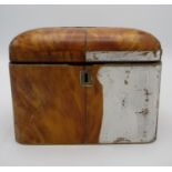 A Regency period tortoiseshell tea caddy, with domed lid lined with red velvet, 13 cm high x 17 cm