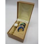 A Gucci gold plated ladies quartz wristwatch, circa 1990, the case back with inscription, boxed with