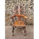 A 19th century burr yew windsor armchair, with elm and other woods, designed with spindle back,