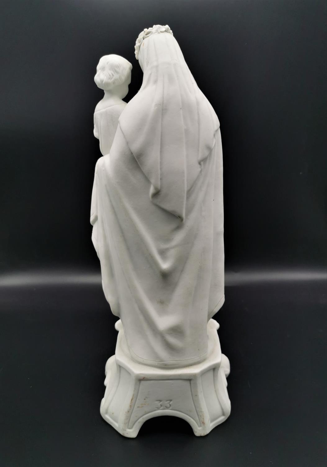 A late 19th century French parian ware model of the Madonna and child by Mauger et Fils, circa 1880, - Image 2 of 3