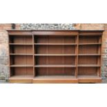 An early 20th century string inlay mahogany breakfront bookcase by P.E Gane, the top with
