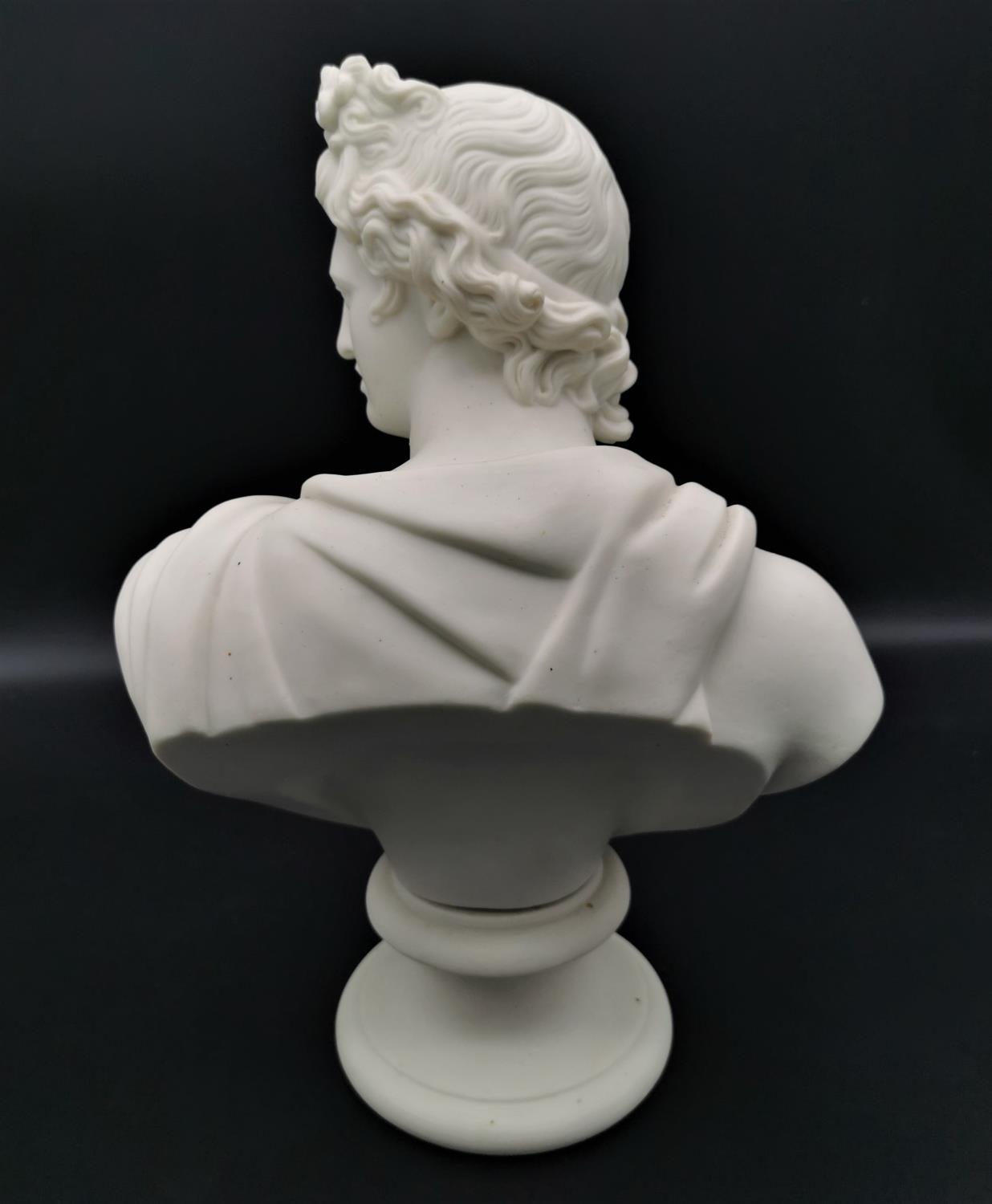 A turn of the century parian ware bust of Apollo after C. Delpech, possibly by Copeland, on a - Image 3 of 4