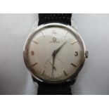 A Omega stainless steel gents manual wind wristwatch circa 1959. The dial having Arabic numerals,