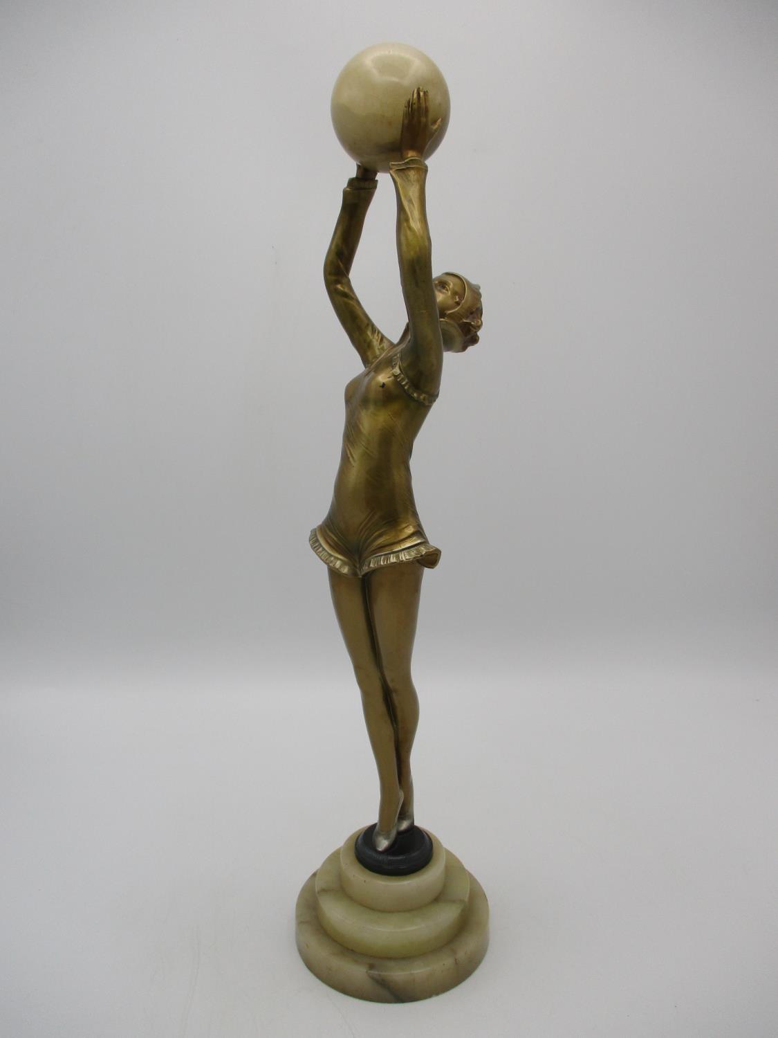 After Josef Lorenzl (1892-1950) 'Ball Girl', an Art Deco gilt spelter model of a dancer holding an - Image 3 of 9