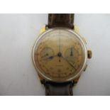 A Titus chronograph 18ct gents manual wind wristwatch circa 1950's. The dial having blued hands