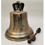 An 18th century heavy cast metal church bell, from a church near the city of Bath, 36 cm high x 35