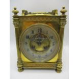 A Late 19th/early 20th century French gilt metal carriage clock with integrated thermometer and