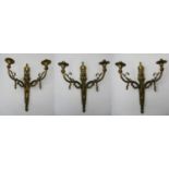 A set of three French Louis XVI style ormolu wall lights, with acanthus leaves and draped