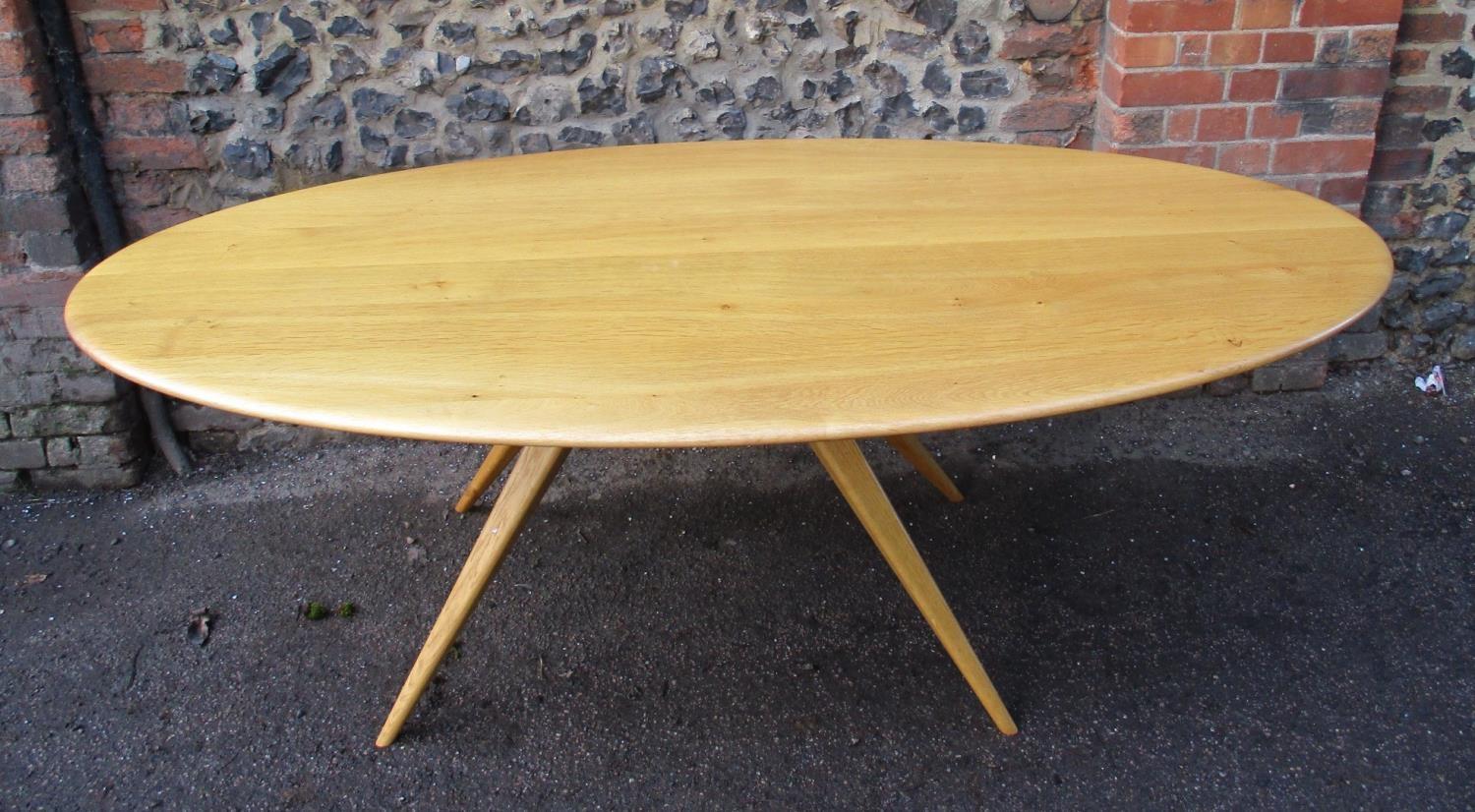 A Modern Design light oak dining table by Benchmark Furniture, of oblong form supported on four - Image 2 of 5