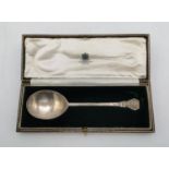 A George V silver spoon by Daniel & John Wellby, London 1927, the back of the bowl designed with