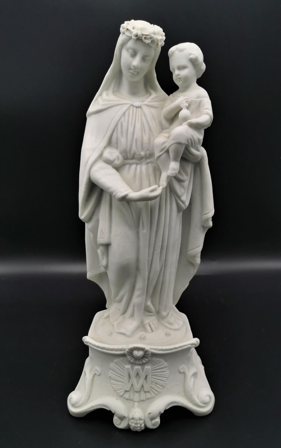 A late 19th century French parian ware model of the Madonna and child by Mauger et Fils, circa 1880,