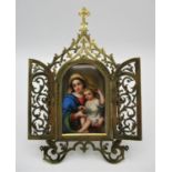 A 19th century devotional, with central painted porcelain plaque depicting the 'Madonna of the