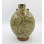 Phil Rogers (b. 1951) British a salt glazed stoneware bottle of ovoid shape with circular base, leaf