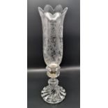 A Baccarat hurricane candlestick, the u shaped shade with acid etched acanthus scrolls, on a moulded