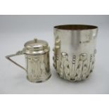 An Edward VII silver mustard pot by Roberts & Belk, in the Art Nouveau style with embossed