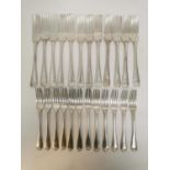 Two sets of twelve late Victorian silver dinner and dessert forks by Josiah Williams & Co, London