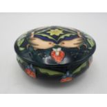 A Moorcroft lidded powder box in the 'Strawberry thief' pattern, decorated with tube line work