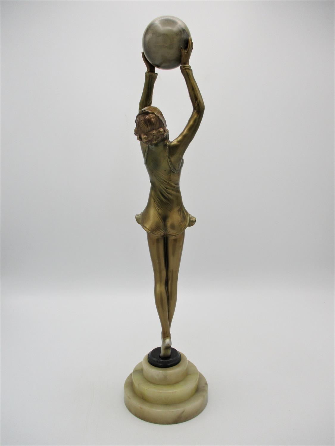 After Josef Lorenzl (1892-1950) 'Ball Girl', an Art Deco gilt spelter model of a dancer holding an - Image 4 of 9