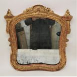 A Georgian style giltwood mirror, with shell and flowers surmount flanked with acanthus terminals