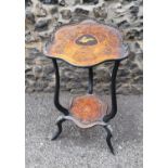 A Victorian marquetry inlaid occasional tripod table, the shaped top with inlaid bird and scrolls,