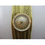 An IWC 18ct gold ladies manual wind wristwatch, circa 1958. The dial having baton markers and
