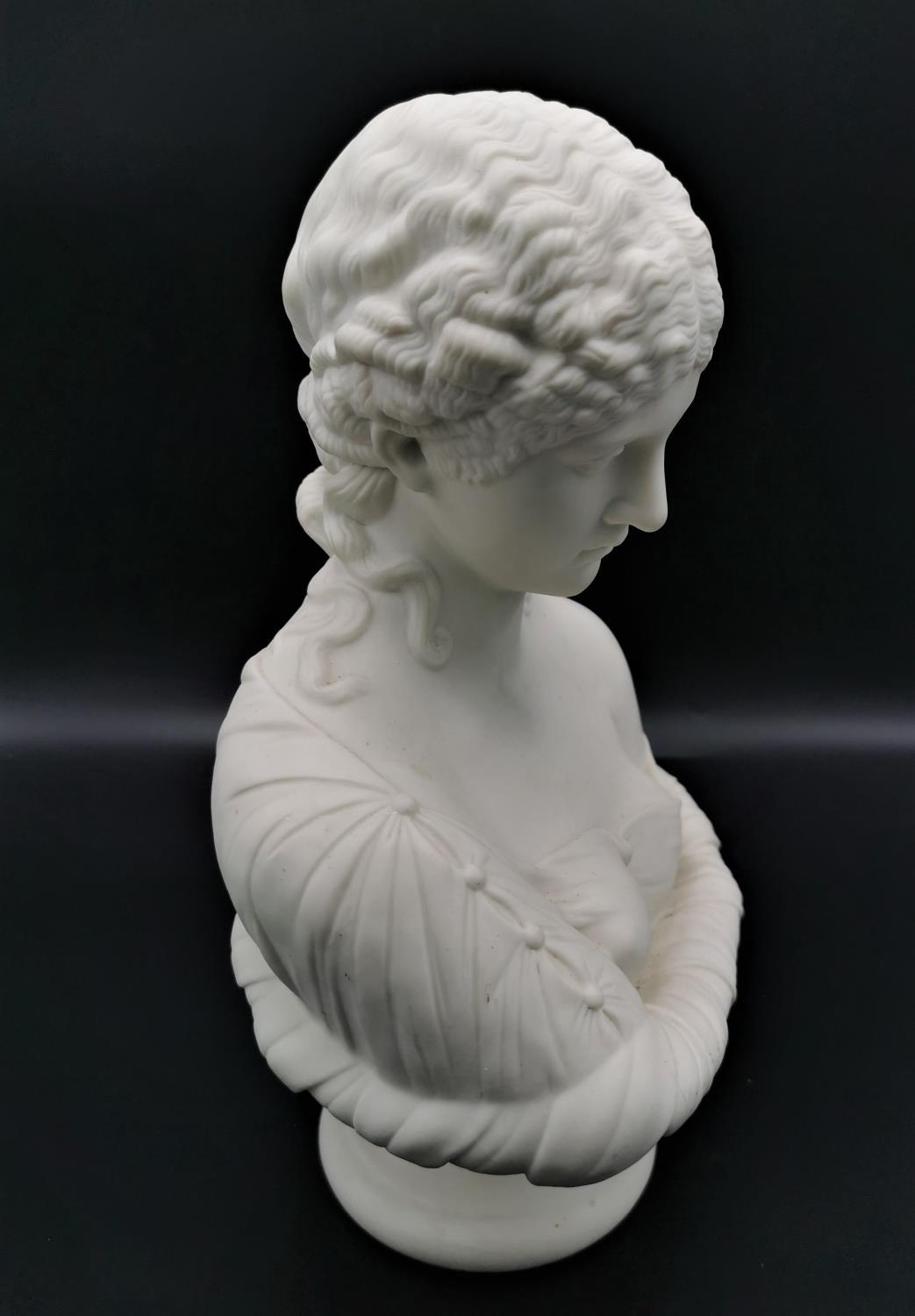 A turn of the century parian ware Neoclassical bust of Clytie, probably by Copeland, on a short - Image 3 of 5