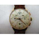 A Universal 18ct Gold Triple Calendar Chronograph Moonphase Wristwatch, circa 1940s. The silvered