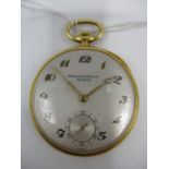 A Patek Philippe 18ct gold manual wind open faced pocket watch. The silvered dial having Arabic