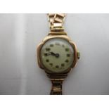 An early 20th century Talis 9ct gold ladies manual wind wristwatch. The dial having arabic numerals,