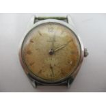A Omega stainless steel gents manual wind wristwatch circa 1947. The dial having luminous hands