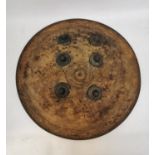 An early Indo-Persian Ottoman dhal shield, made from rhino hide, with six aligned bosses to the dome