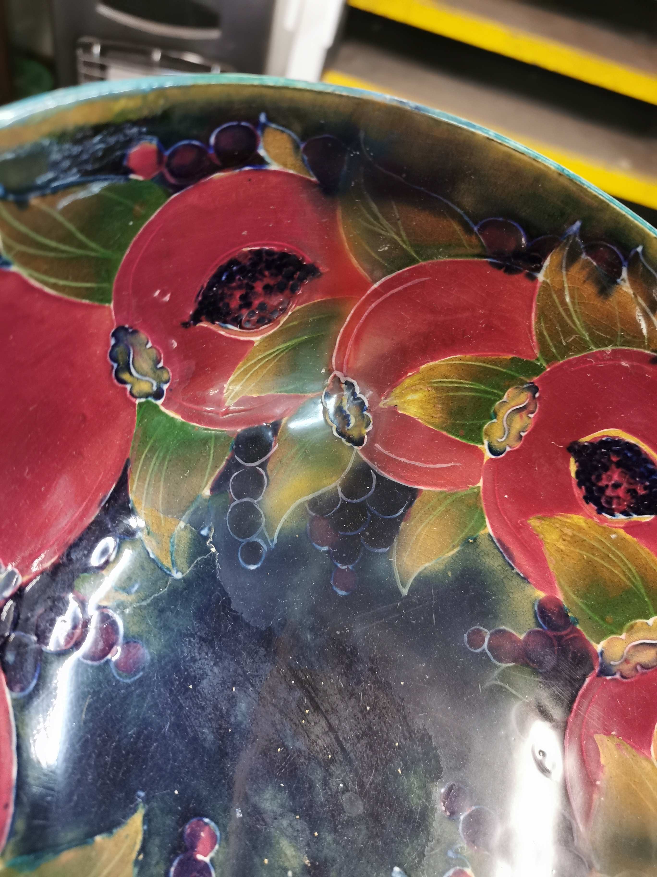 A large William Moorcroft bowl in the pomegranate pattern, raised on a small circular base, with - Image 8 of 8