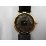 A Must de Cartier silver gilt ladies quartz modern wristwatch, the brown dial with gilt Roman