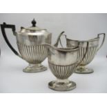 A late Victorian silver three piece tea set by William Mammatt, Sheffield 1885, comprising a teapot,