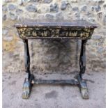A Regency period Chinoiserie lacquer sewing table, of rectangular form with gilt embellishment