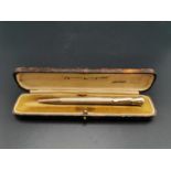 A 9ct gold cased Mordan Everpoint propelling pencil with clip, decorated with engine turned