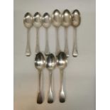 A group of six Victorian silver spoons, London 1887, comprising three serving spoons and three