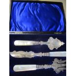 A silver and mother of pearl cased serving set