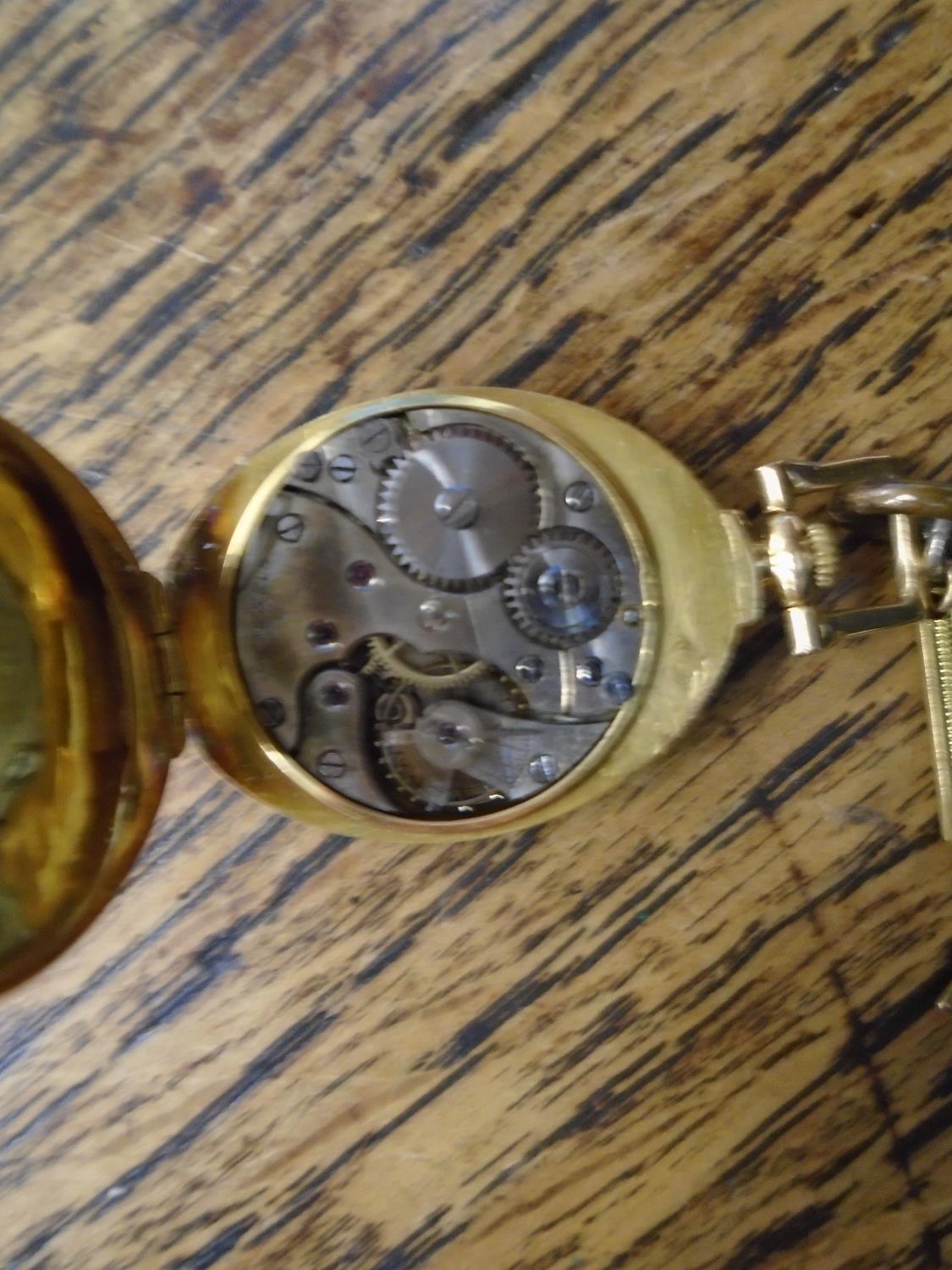 An 18ct gold cased Swiss lever pendant watch, 15 jewel movement, the case with angular binged top - Image 4 of 4