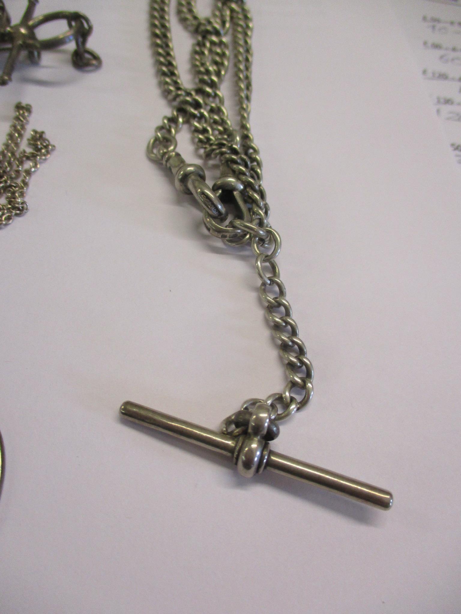 A silver fob watch chain, a silver ingot pendant on a white metal chain, two silver bangles and - Image 5 of 6