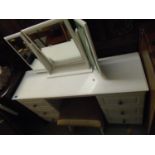 A white painted knee hole dressing table with pedestals of three drawers, 75 x 125 x 39cm, a